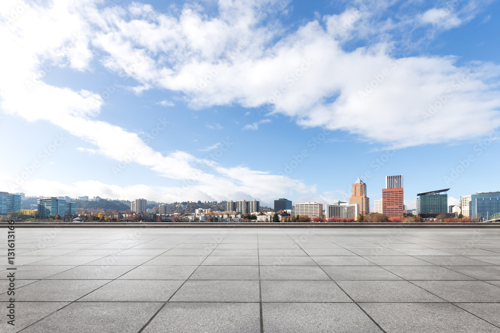 cityscape and skyline of portland from empty brick floor