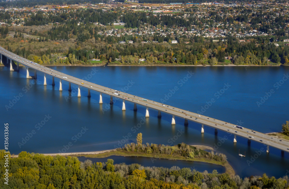 Fototapeta premium Bridge across Columbia River, connecting Portland, OR and Vancouver, WA. Scenic river view.