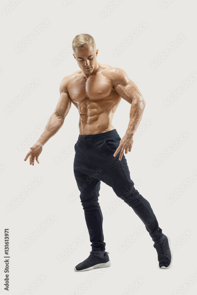Full-length shot of young man with muscular body Full-length shot of young man with muscular body