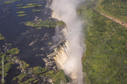 Fototapeta Naklejka Na Ścianę i Meble -  Helicopter flights over the  Zambezi River and Victoria Falls in Zambezi National Park is a highlight for tourist visiting the world famous Landmark