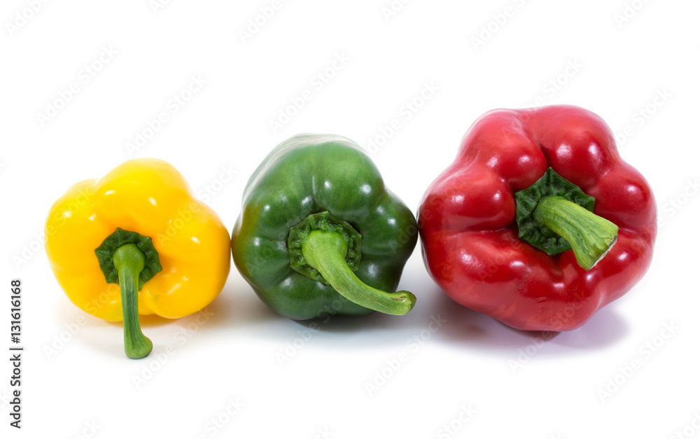three bell peppers (paprika) isolated on white background three bell peppers (paprika) isolated on white background