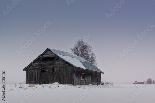 Old Barn House On The Snowy Fields