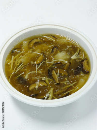 chinese healthy food - vegetarian braised bamboo piths and enoki mushroom in brown soup