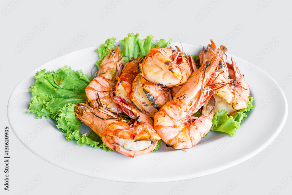 Shrimp grilled with dish isolated on white background Shrimp grilled with dish isolated on white background