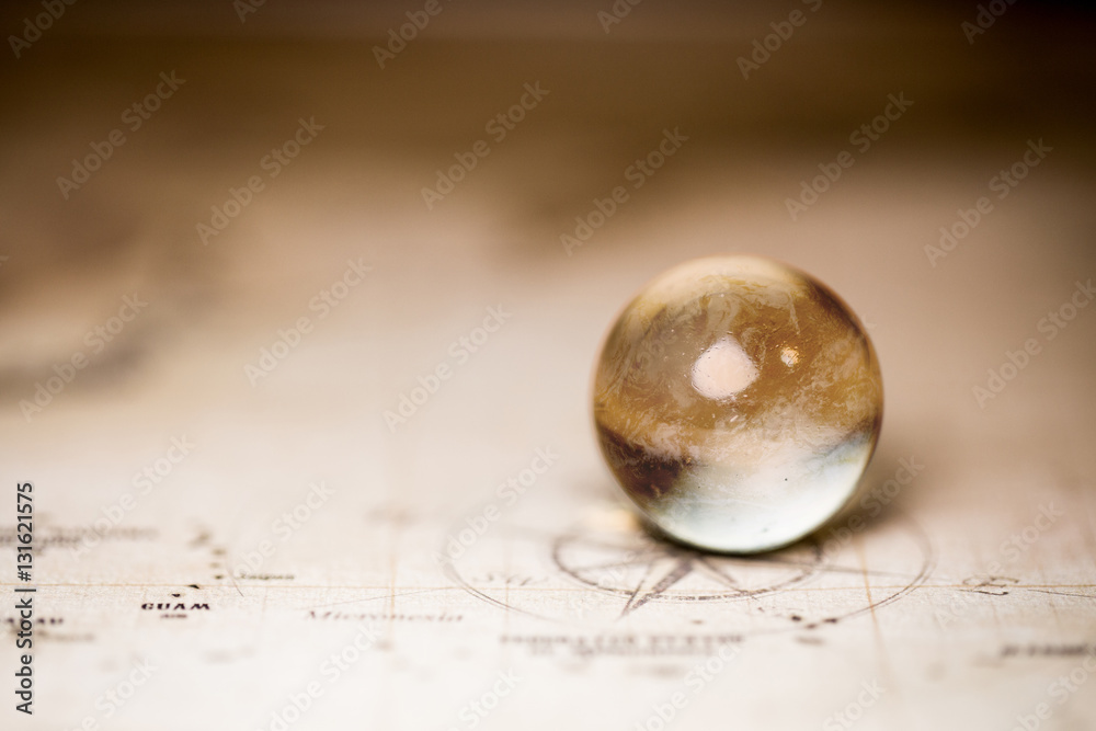 Fototapeta premium Planet concept with map focusing on compass.