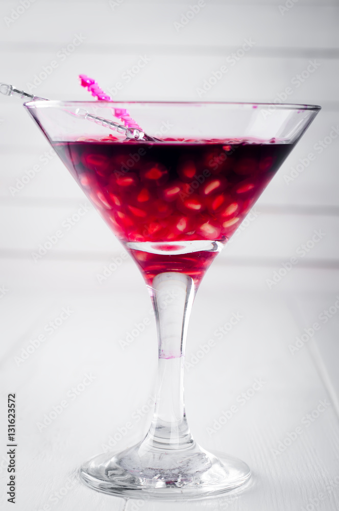 pomegranate cocktail and ripe red fruit pomegranate cocktail and ripe red fruit