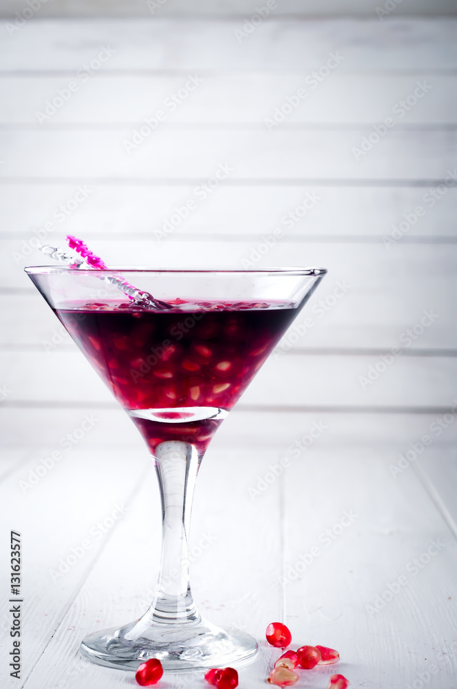 pomegranate cocktail and ripe red fruit pomegranate cocktail and ripe red fruit
