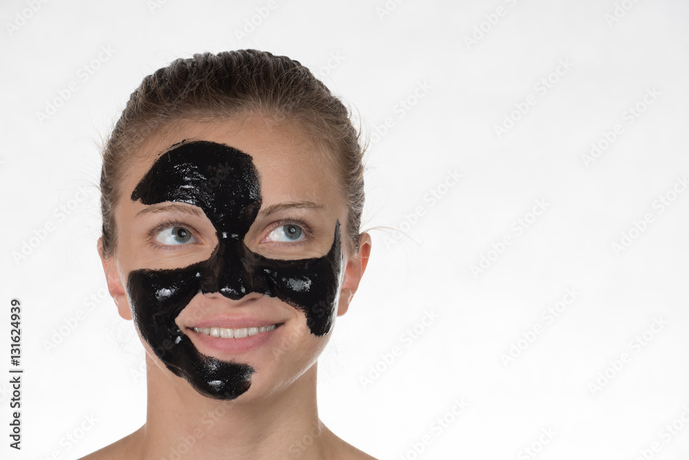 Happy beautiful girl with acne on a white background in a cosmet Happy beautiful girl with acne on a white background in a cosmet