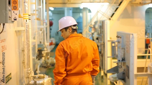 Engineer is walking in the ER.