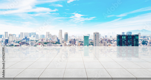 Business concept - Empty concrete floor top with panoramic modern cityscape building bird eye aerial view under sunrise and morning blue bright sky of Tokyo  Japan for display or montage product