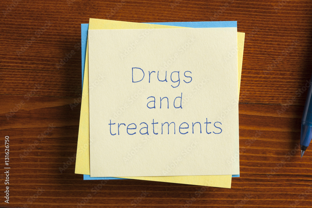 Drugs and treatments written on a note Drugs and treatments written on a note