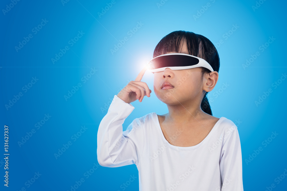 Asian Chinese little girl with futuristic eyeglassses in isolate Asian Chinese little girl with futuristic eyeglassses in isolate