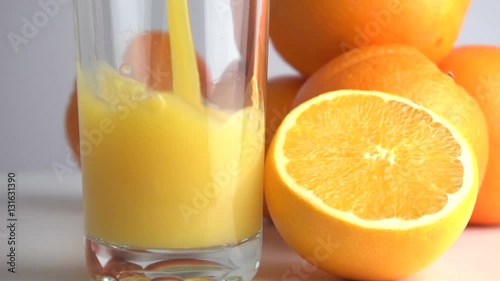 Orange juice and slices of orange