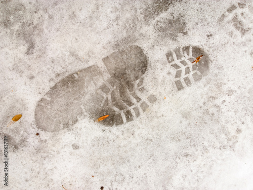 Footprint in the snow.