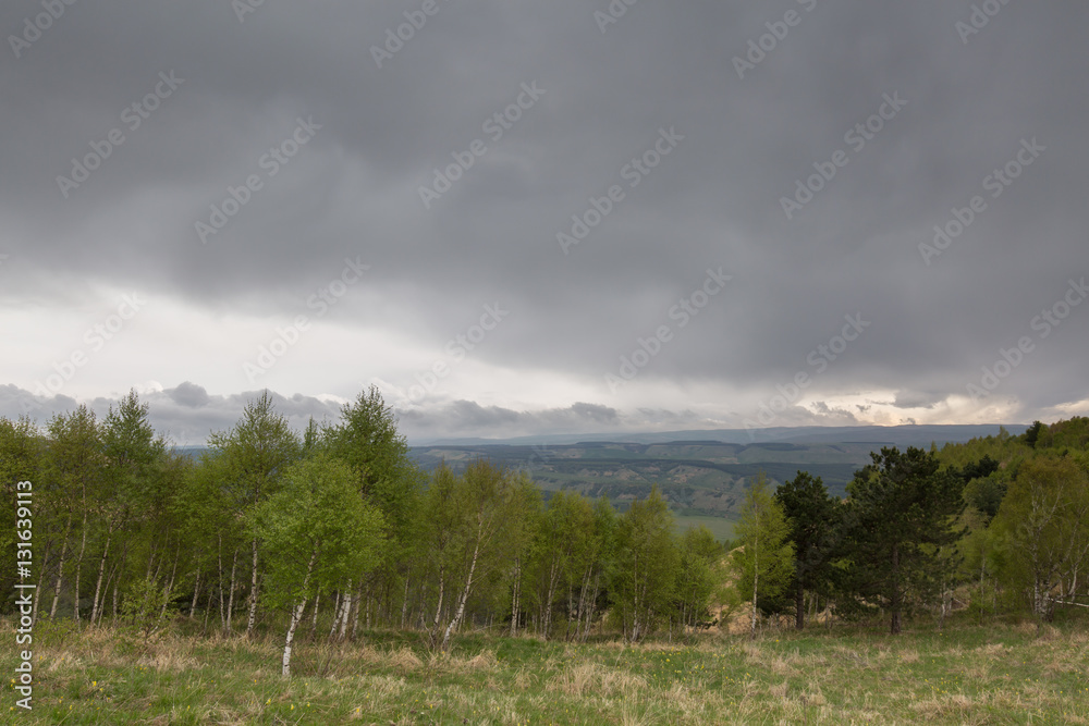 The formation and movement of spring clouds over the high Caucasus mountains The formation and movement of spring clouds over the high Caucasus mountains