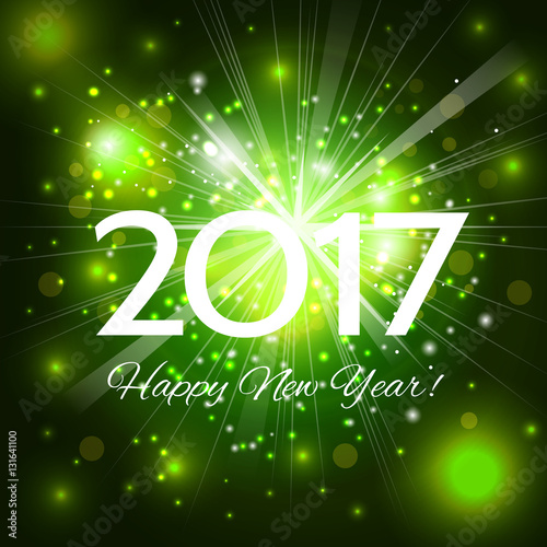 Beautiful green fireworks with  greetings Happy New Year 2017!