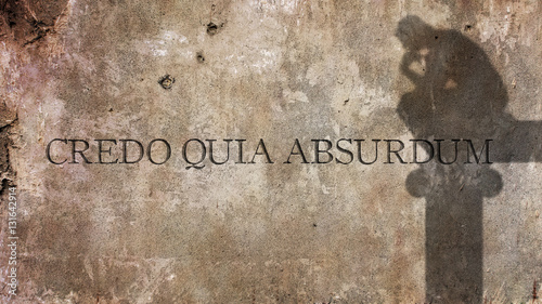 Credo quia absurdum is a Latin phrase that means I believe because it is absurd photo