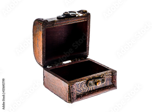 Old wood chest jewelry box closed isolated on white background.