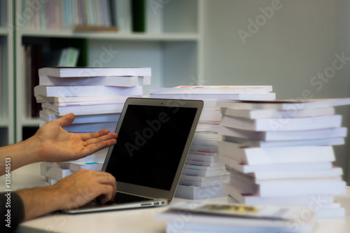 Guy or man or student or businessman work on a laptop computer i