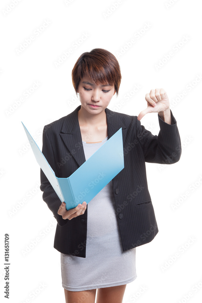 Young Asian working woman thumbs down with folder. Young Asian working woman thumbs down with folder.