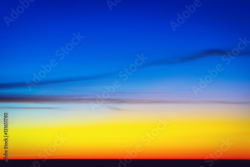 Sunset with blue sky and clouds blue and orange background nature