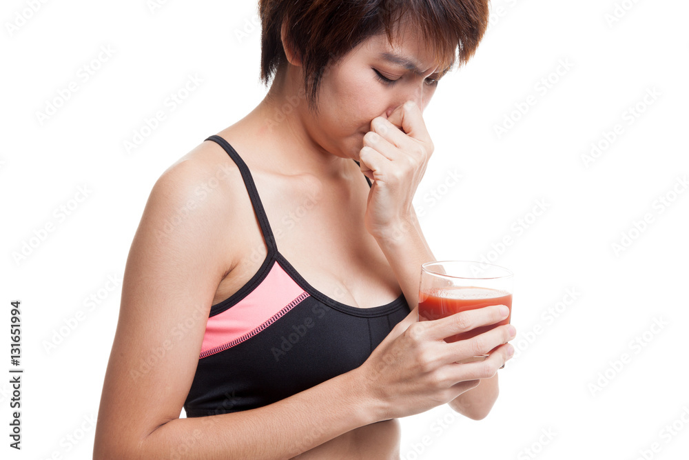 Beautiful healthy Asian girl hate tomato juice. Beautiful healthy Asian girl hate tomato juice.