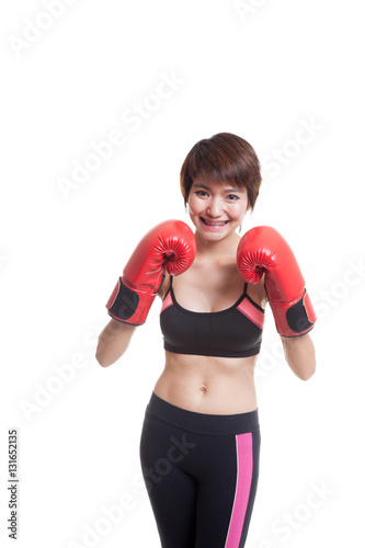 Beautiful healthy Asian girl with red boxing glove.