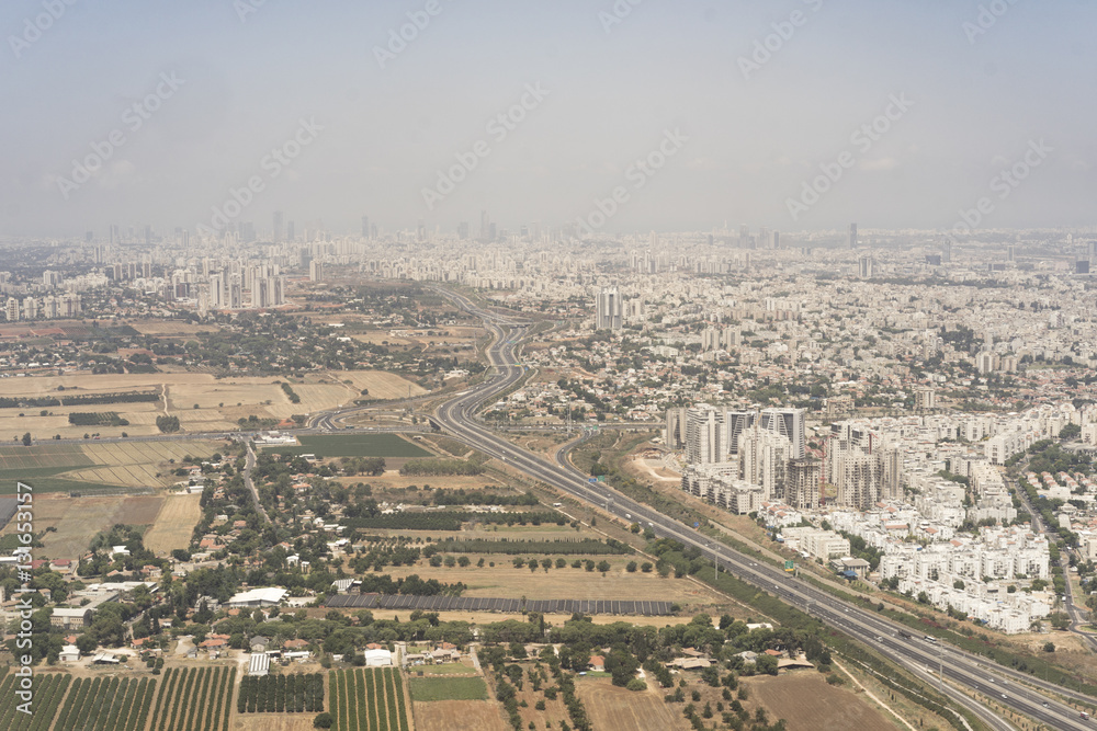 Old buildings, fields and new skyscrapers in Tel Aviv, Israel Old buildings, fields and new skyscrapers in Tel Aviv, Israel
