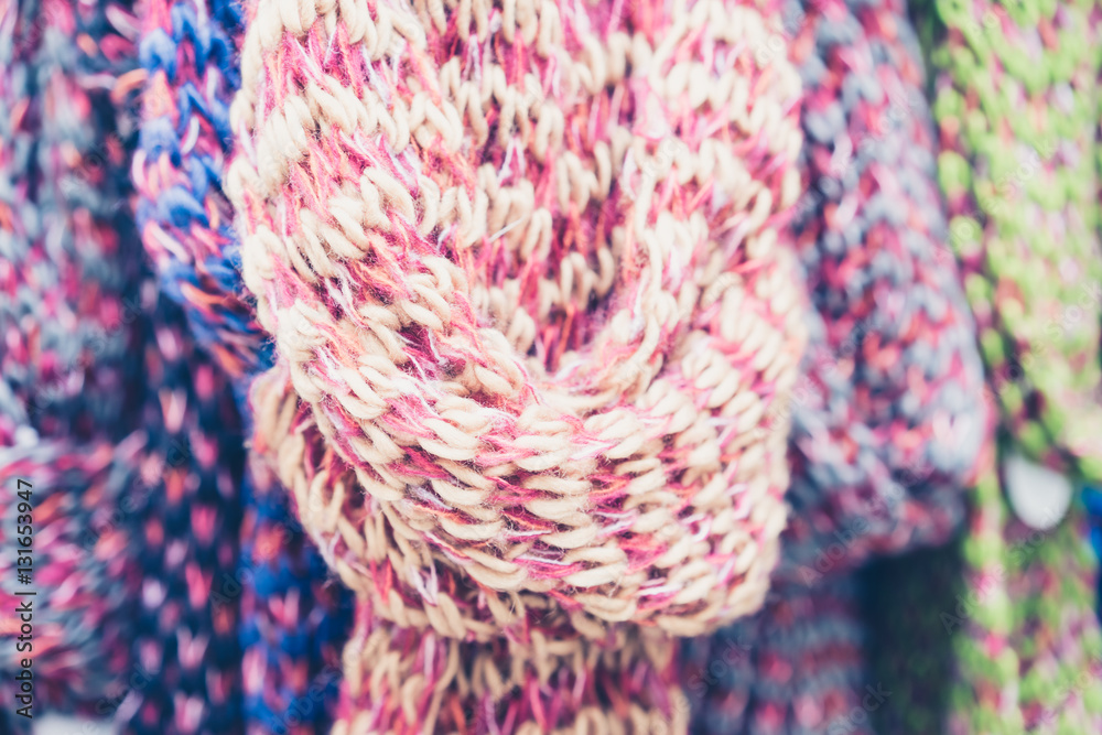 Close-up of pink knit scarf