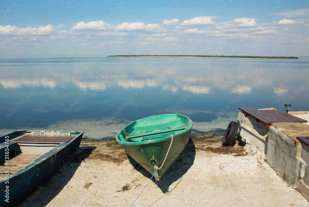 Fishing boat on the shore of the sea. Fishing boat on the shore of the sea.