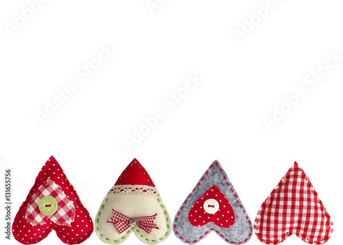 Hand made textile hearts. Textile handicraft isolated on white background. Valentines Day, Wedding composition with hearts. Top view.