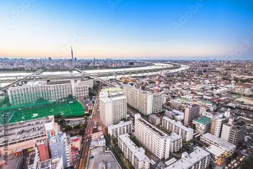 Asia Business concept for real estate and corporate construction - panoramic modern cityscape building bird eye aerial view with tokyo skytree under sunrise and morning blue bright sky in Tokyo Japan