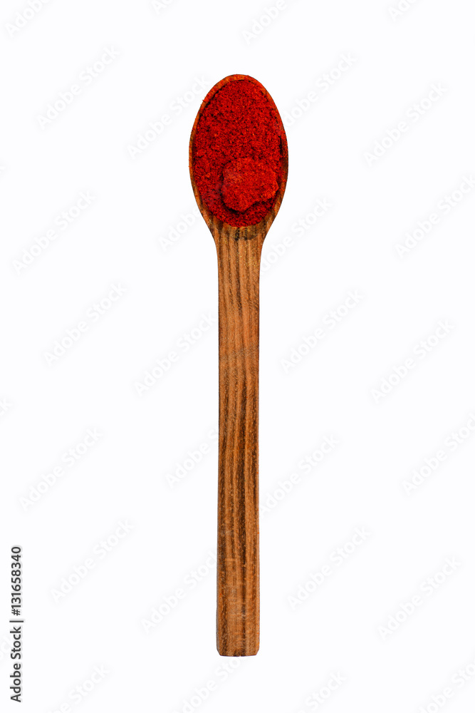 colorful paprika in wooden spoon colorful paprika in wooden spoon