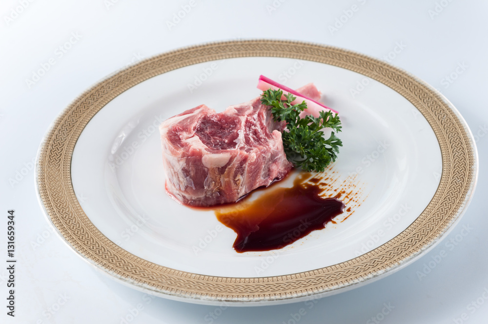 Fototapeta premium raw fresh lamb chop on white background