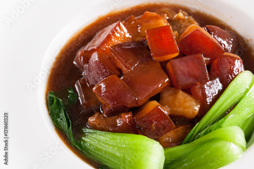 Pork braised in brown sauce with vegetables, Chinese dishes photo
