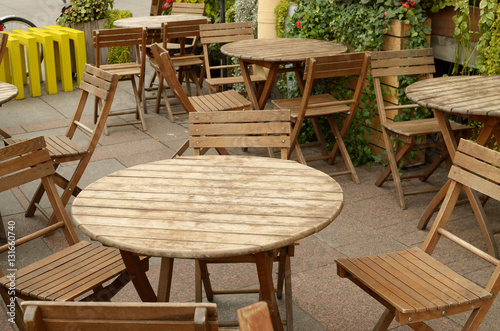 Empty tables in a cafe. © borroko72