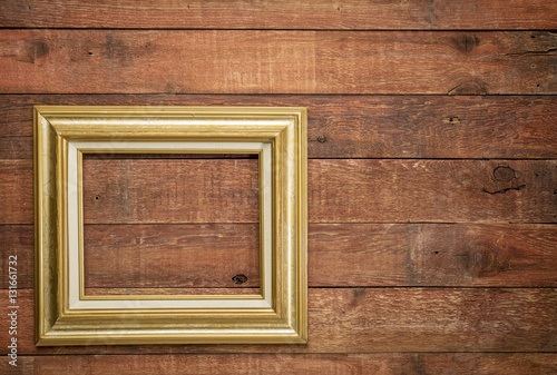 picture frame against rustic wood