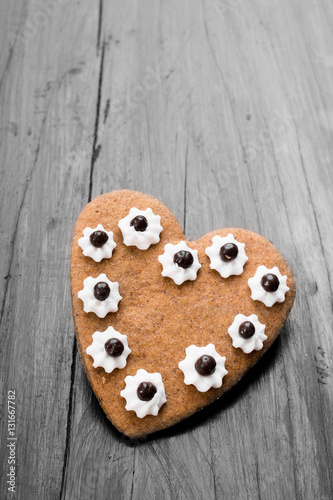 Heart shaped cookies on dark wooden background