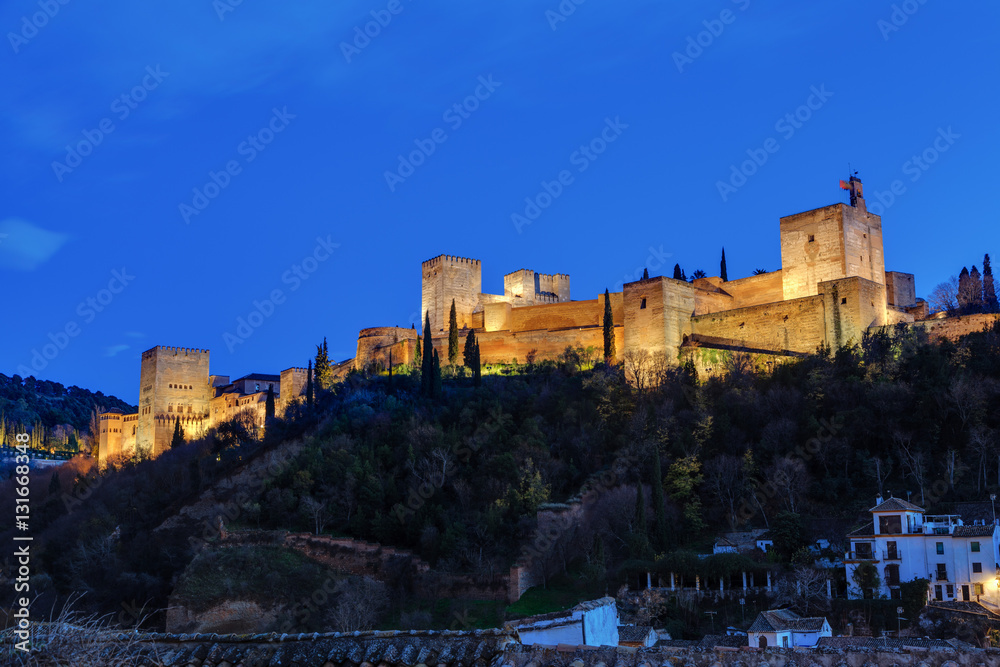 Night view of the Alhambra from the Mirador de Carvajales.