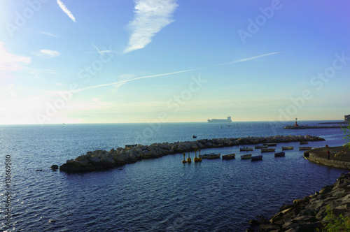 The seafront of Naples  the pier with boats