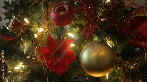 multi-colored Christmas toys red flower c stones on Christmas barely in the room