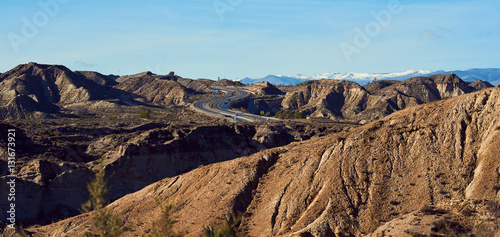 Highway through the slopes of Tabernas desert, Spain