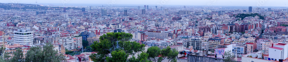 Large panoramic view on Barcelona city in summer from park Guell hill, Spain