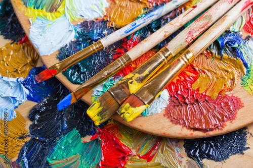 Brushes and paint on the table