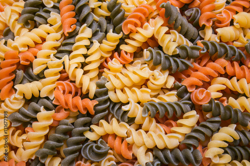 Colored fusilli. Pasta, macaroni background, texture