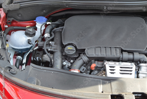 Engine of a car under opened hood