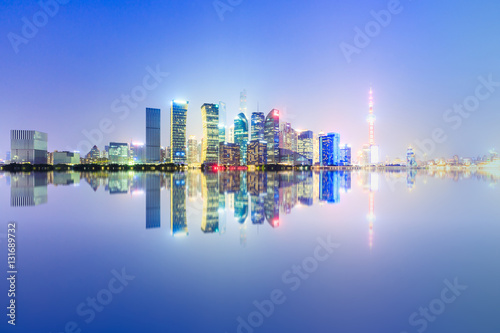 Shanghai skyline and modern cityscape at night,China © ABCDstock
