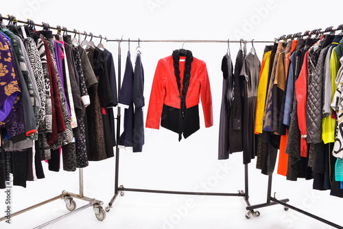 Variety of colorful female clothing on hanging