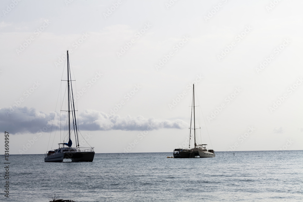 Two Catamaran Sailboats At Anchor Kona Hawaii