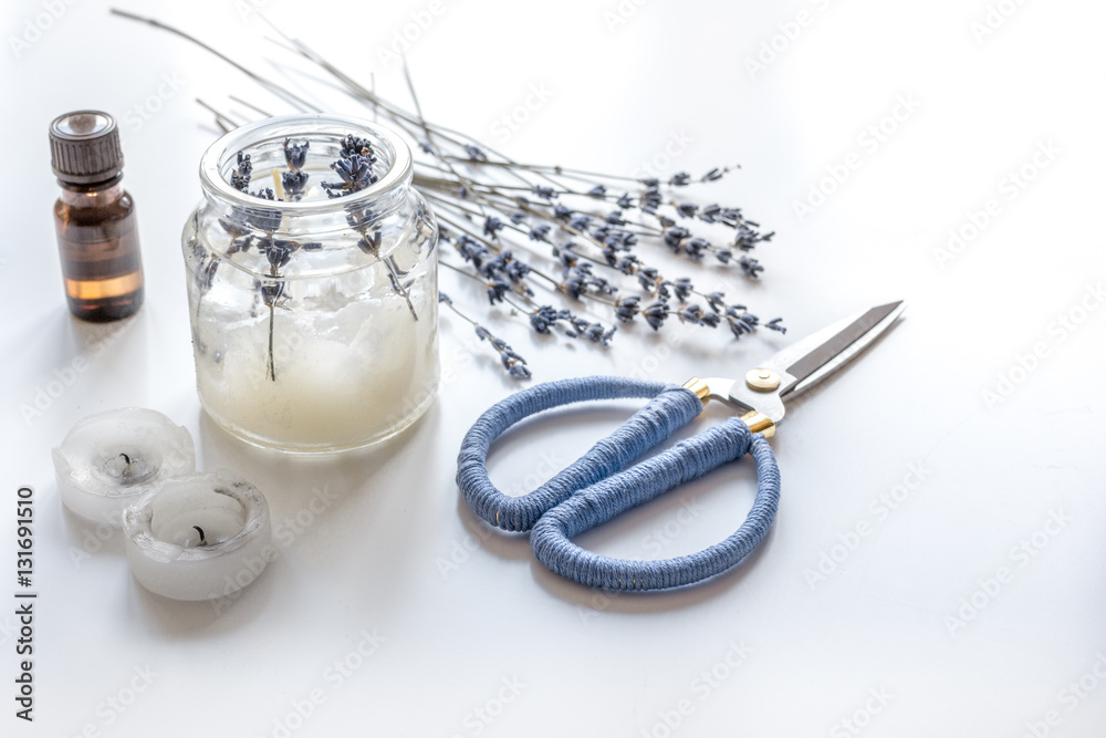 handmade candles with lavender on white background handmade candles with lavender on white background